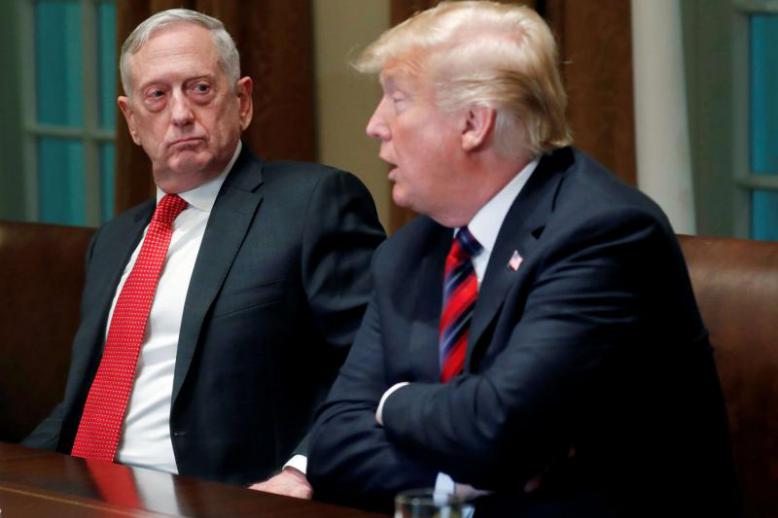 US Defense Secretary James Mattis listens (L) as US President Donald Trump speaks at the White House in Washington, on October 23