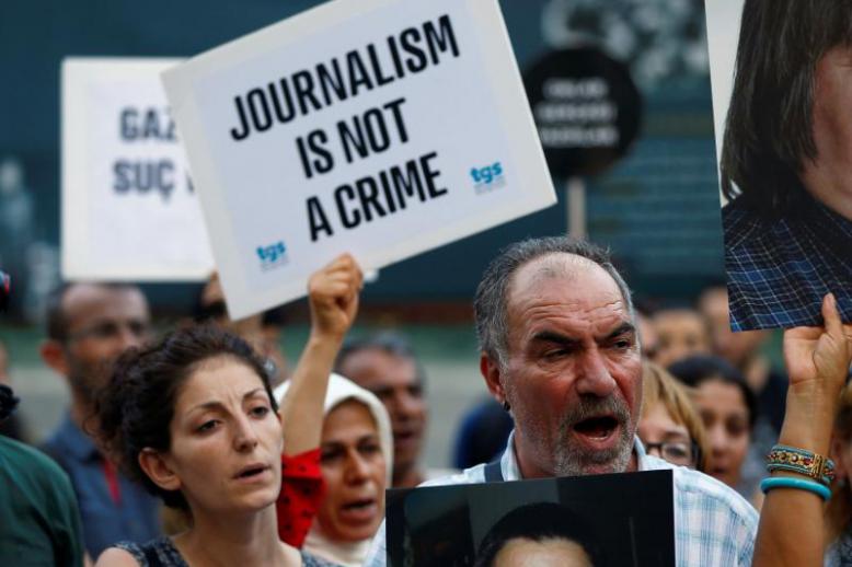 A 2016 file picture shows demonstrators shouting slogans during a protest against the arrest of prominent journalists in central Istanbul