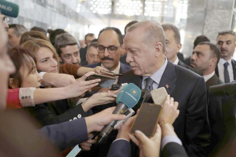 Empty rhetoric. Turkey’s President Recep Tayyip Erdogan speaks to the media at the parliament in Ankara, January 8.