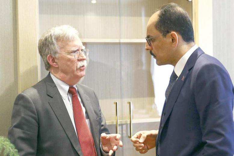 Slighted. US national security adviser John Bolton (L) speaks to Turkish presidential spokesman Ibrahim Kalin (R) following their meeting in Ankara, January 8