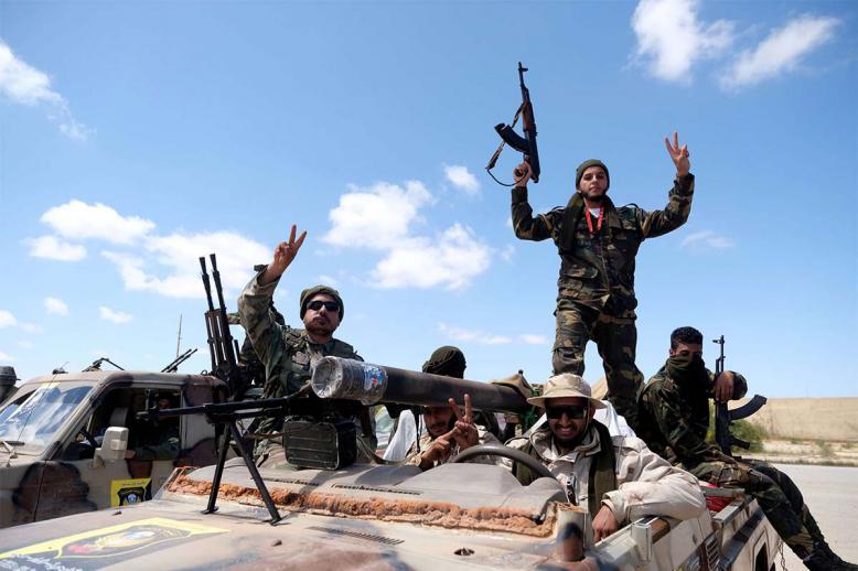 Libyan National Army (LNA) members head out of Benghazi to reinforce troops advancing towards Tripoli
