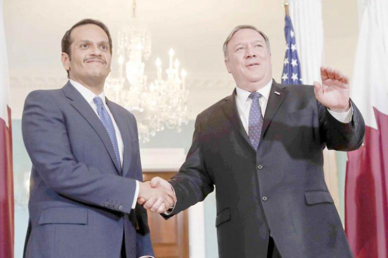 US Secretary of State Mike Pompeo (R) and Qatari Foreign Minister Sheikh Mohammed bin Abdulrahman al-Thani at the State Department in Washington