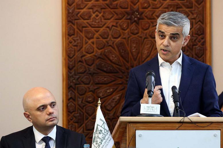 London Mayor Sadiq Khan (R) and British Home Secretary Sajid Javid