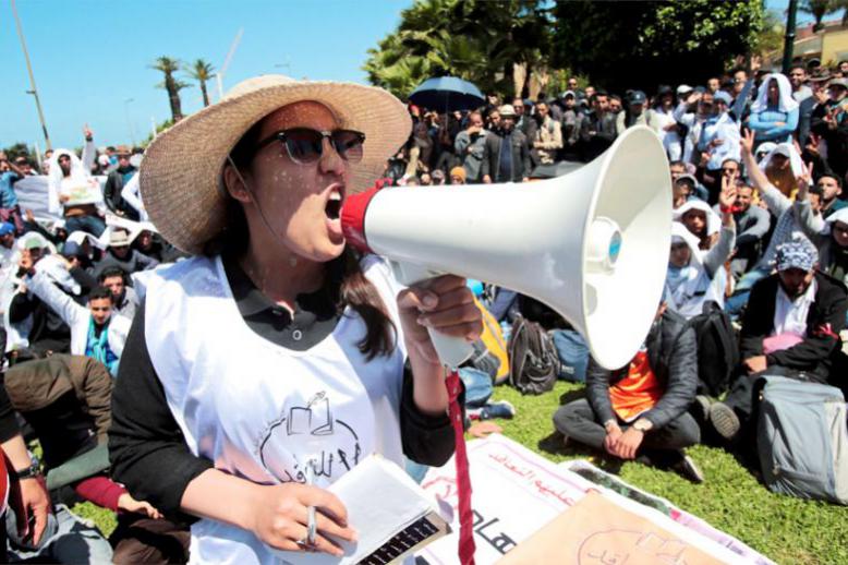Young teachers take part in a protest demanding their integration in the civil service as employees of the education ministry in Rabat