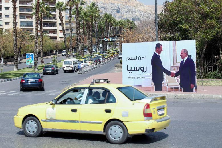 جدارية في دمشق للرئيسين بشار الأسد وفلاديمير بوتين