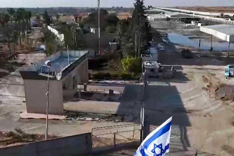 Israeli tanks entering the Palestinian side of the Rafah border crossing