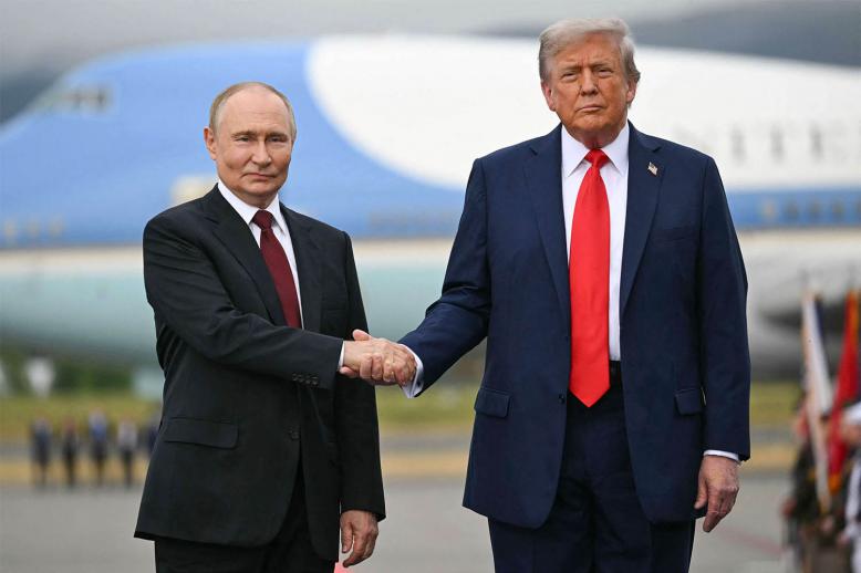 Putin shaking hands with Trump