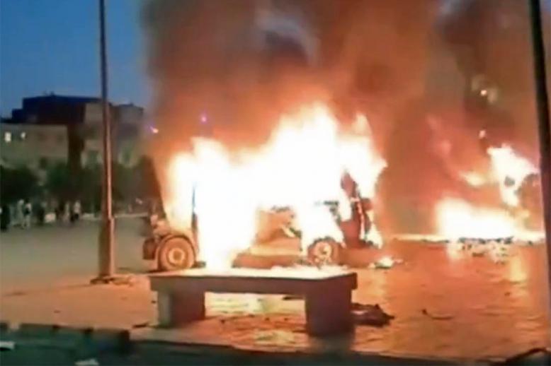 A burning car during the youth-led protests in Inzegane, near Agadir