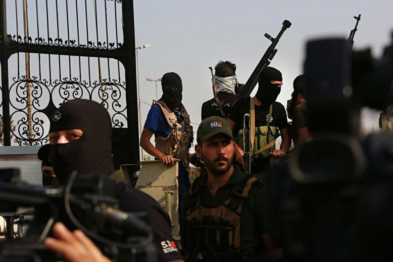 السلاح المنفلت يحرج بغداد 