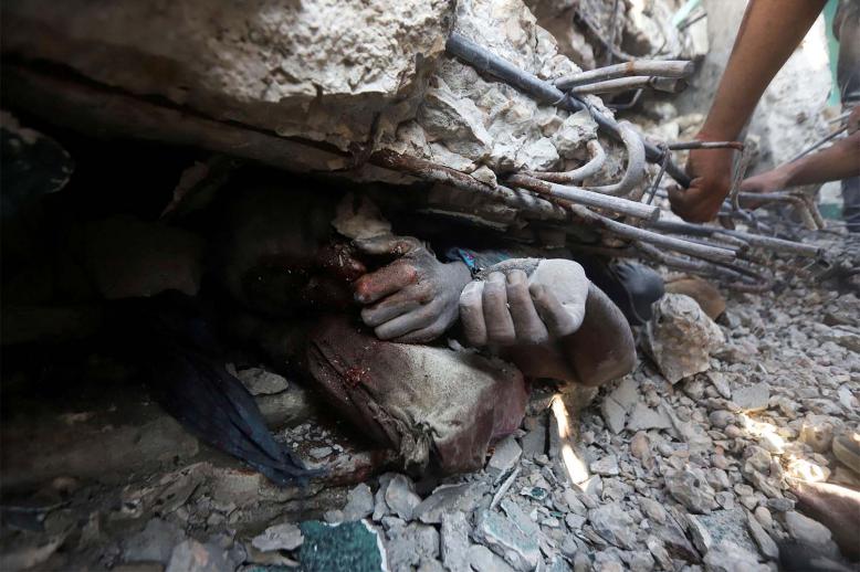 USAID staff reported seeing a human femur and other bones on the roads, dead bodies abandoned in cars