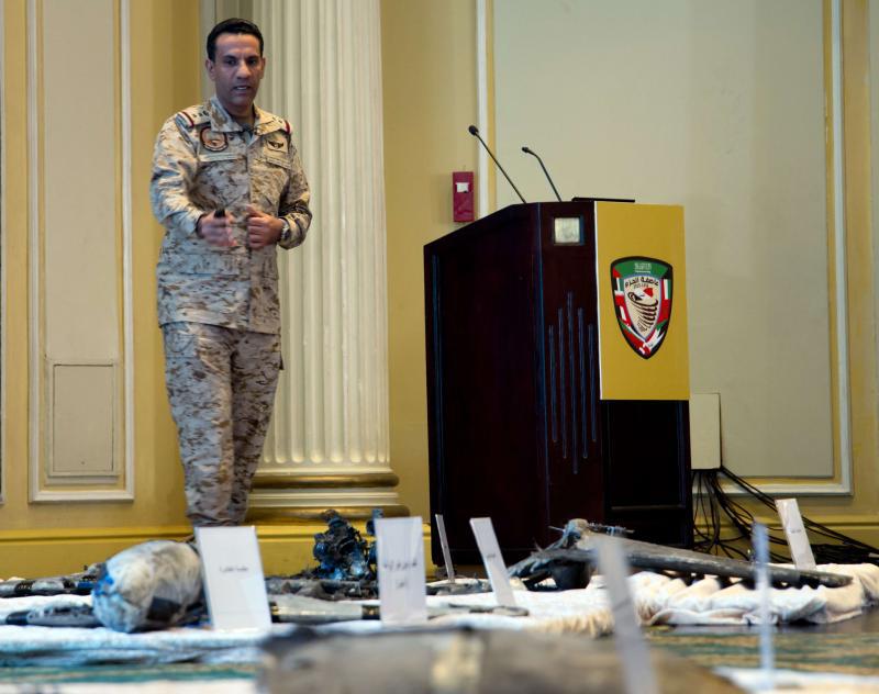Colonel Turki al-Malki, spokesman for the Saudi-led coalition in Yemen, displays wreckage from Iranian-Houthi suicide drones in Khobar city, last April