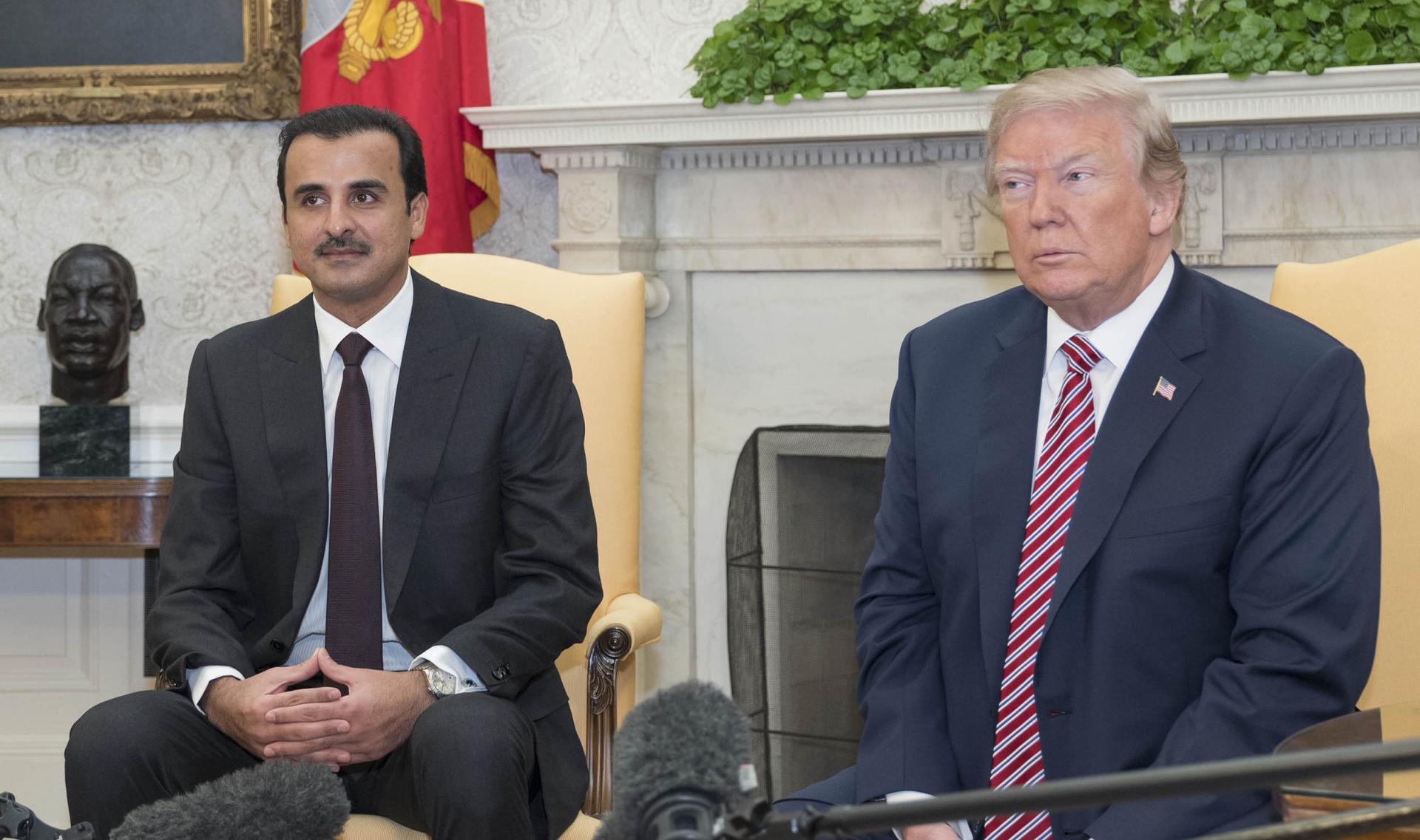 أمير قطر الشيخ تميم بن حمد والرئيس الأميركي دونالد ترامب