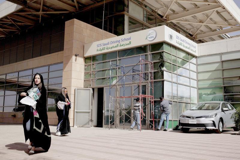 Women leave the Saudi Driving School inside Princess Nora University in Riyadh