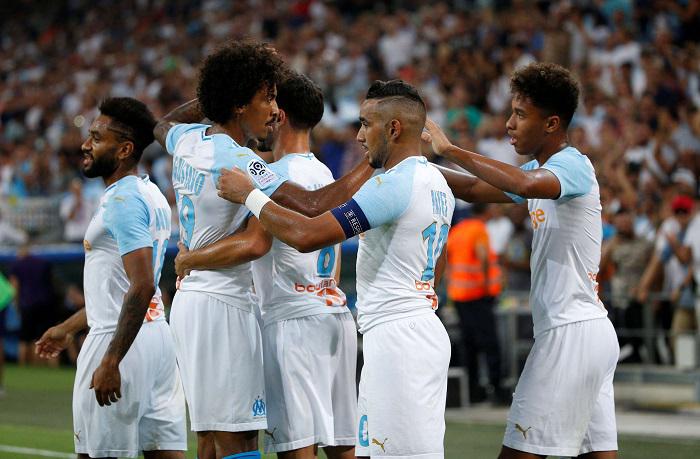 ديميتري باييت يحتقل بهز شباك تولوز  مع رفاقه