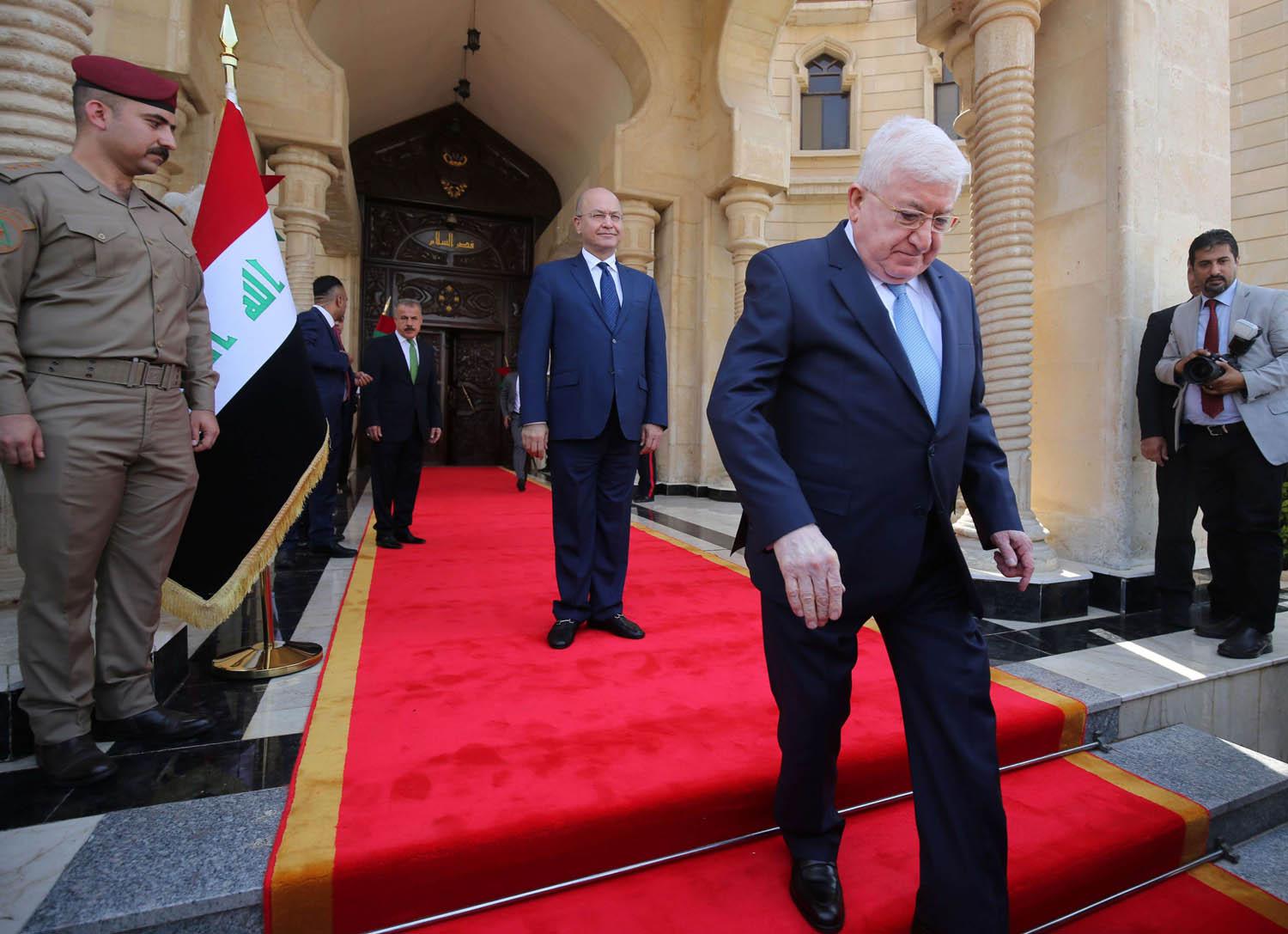 الرئيس العراقي المغادر فؤاد معصوم والرئيس العراقي الجديد برهم صالح