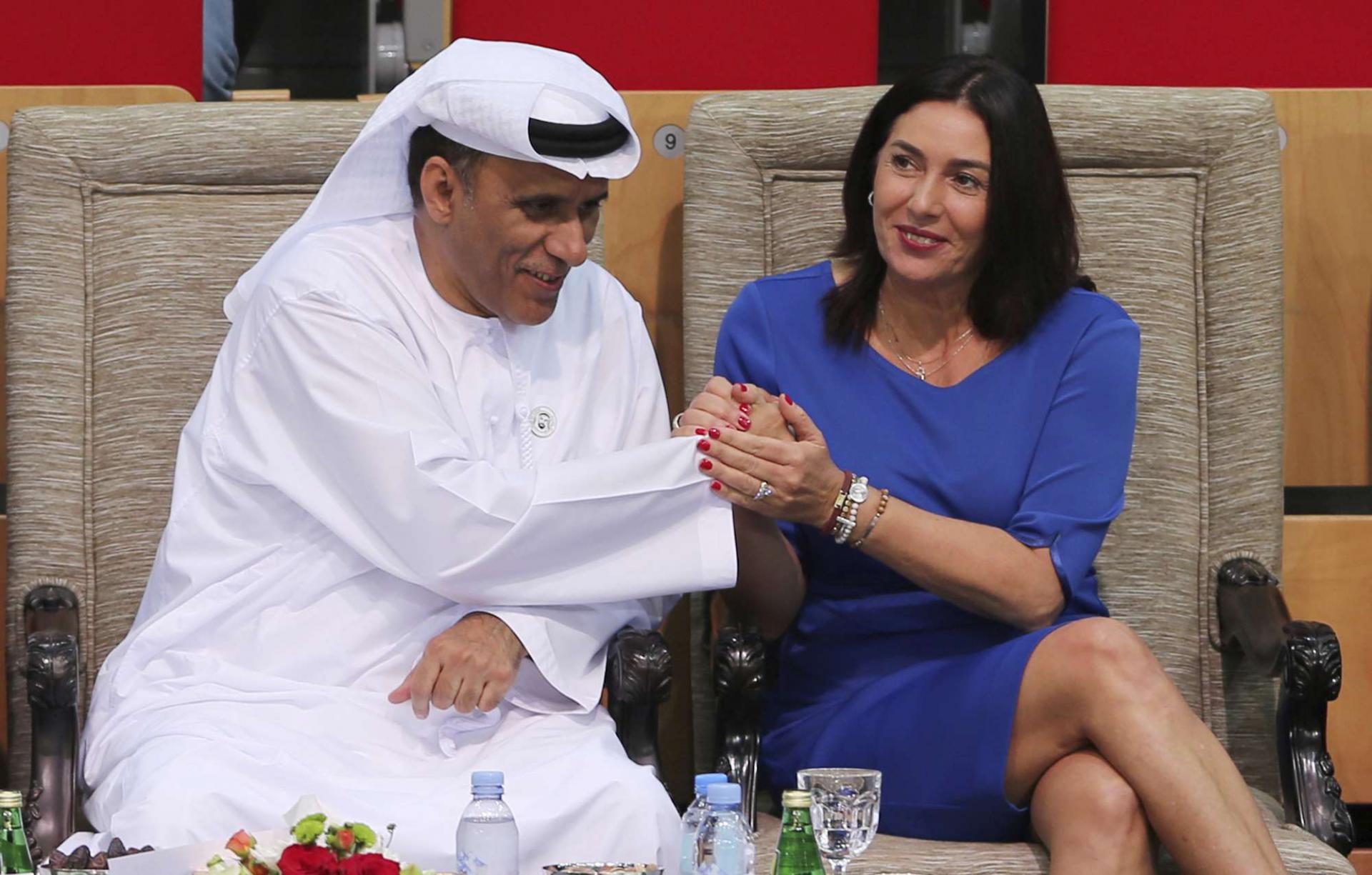 Israeli Culture and Sport Minister Miri Regev, right, shakes hands with Mohamed Bin Tha'loob Al Derai, President of UAE Wrestling Judo & Kickboxing Federation.