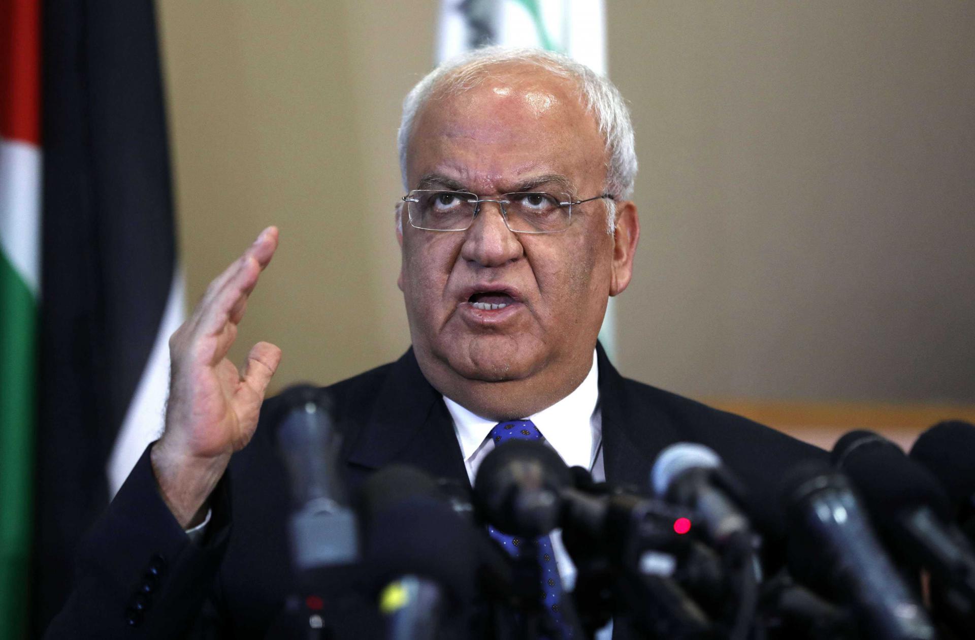 Palestine Liberation Organization's Secretary General Saeb Erekat speaks to journalists during a press conference in the West Bank