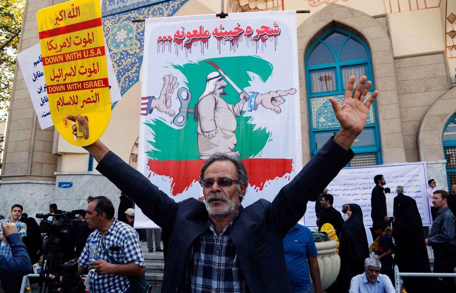 An Iranian man participates in an anti-Saudi demonstration in the capital Tehran on September 9, 2016.