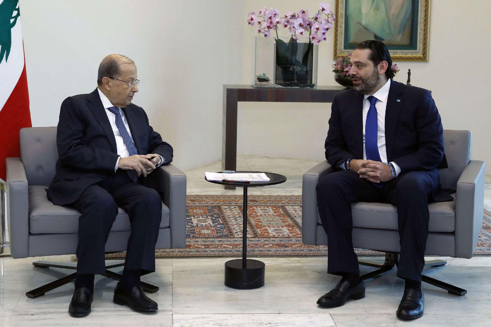 Lebanese President Michel Aoun, left, meets with Prime Minister Saad Hariri, at the Presidential Palace in Baabda.