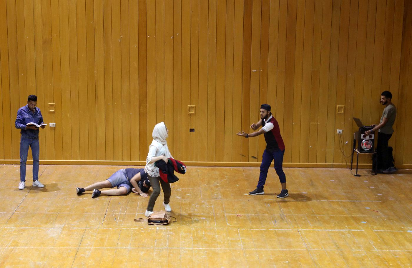 A co-ed Libyan theatre group perform on stage in Tripoli, Libya October 17, 2018.