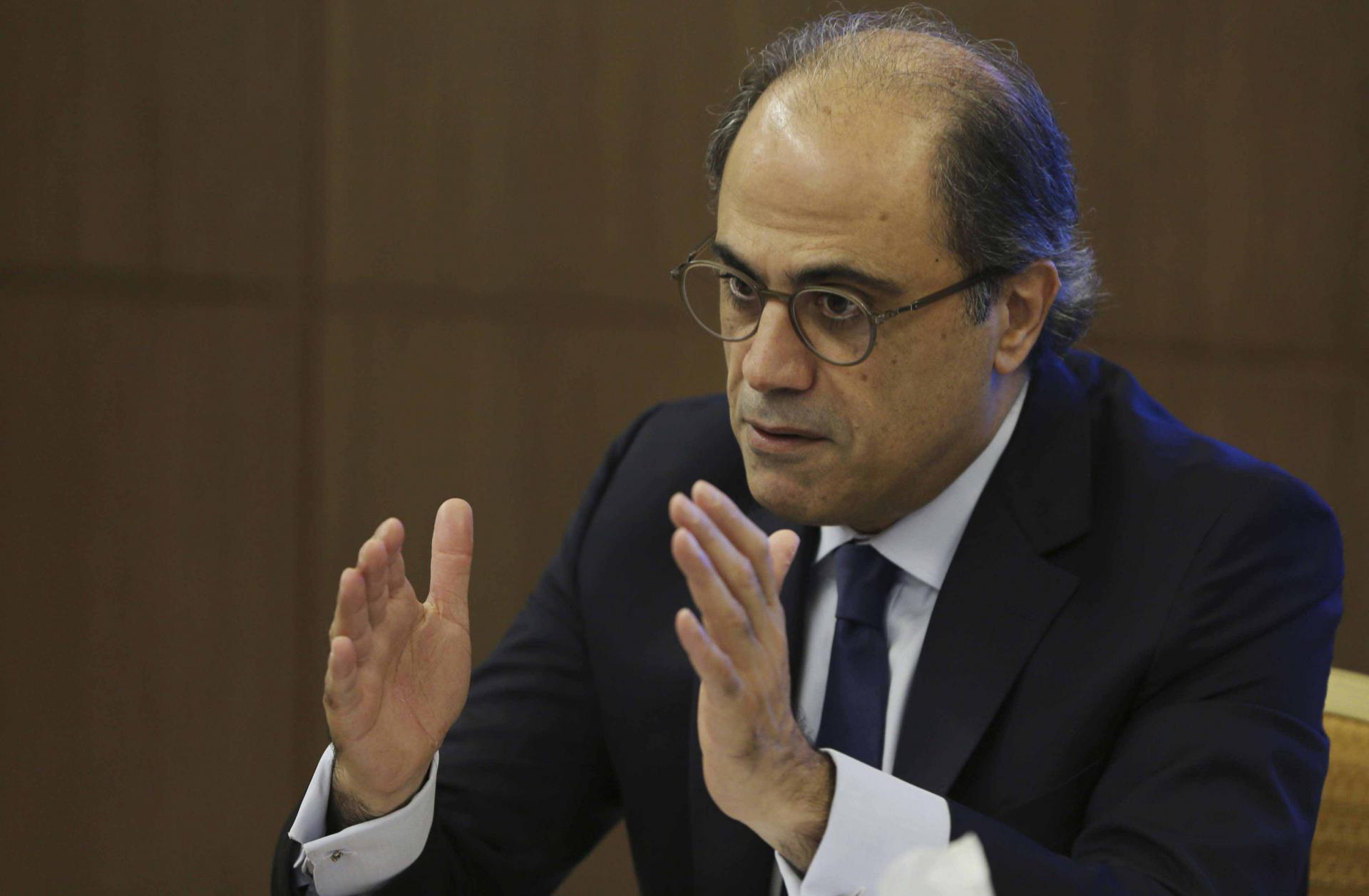 Jihad Azour, the IMF's Mideast and Central Asia director, talks during his press conference in Dubai, United Arab Emirates