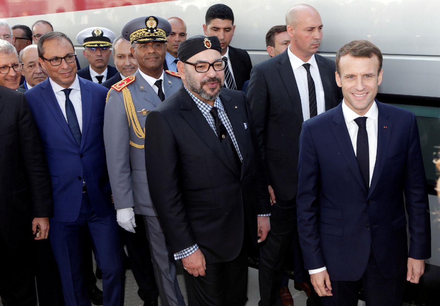 French President Emmanuel Macron (R) and Moroccan King Mohammed VI (C) attend the launch ceremony in Tangiers.