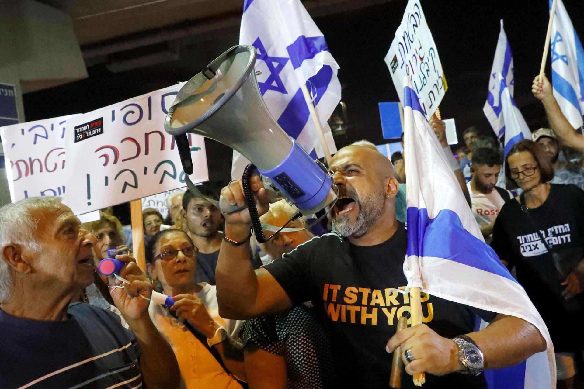 Residents of the southern district of the Israeli city of Tel Aviv protest against the presence of African refugees and asylum seekers on August 30, 2018