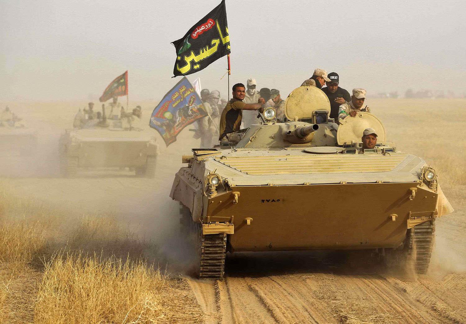 مدرعات للحشد الشعبي خلال عمليات عسكرية في كركوك