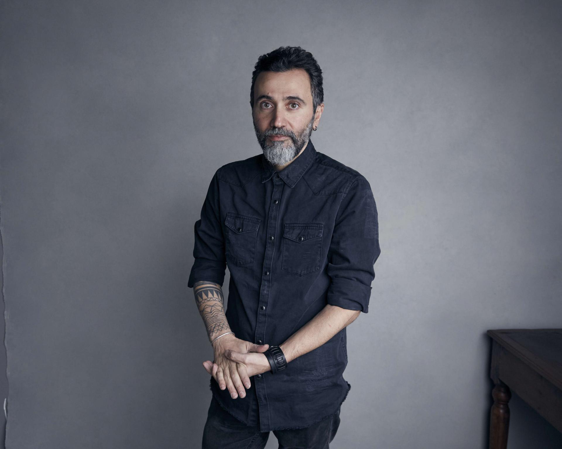 Director Talal Derki poses for a portrait to promote the film, "Of Fathers and Sons, at the Music Lodge during the Sundance Film Festival on Sunday, Jan. 21, 2018, in Park City, Utah.