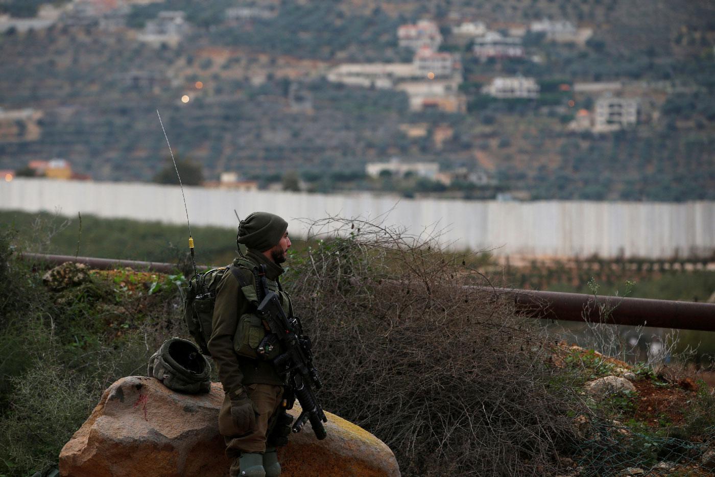 An Israeli soldier guards near the border with Lebanon on December 5, 2018.