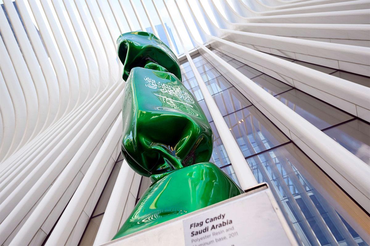 A sculpture with the flag of Saudi Arabia is part of an exhibit called 'Candy Nations' 