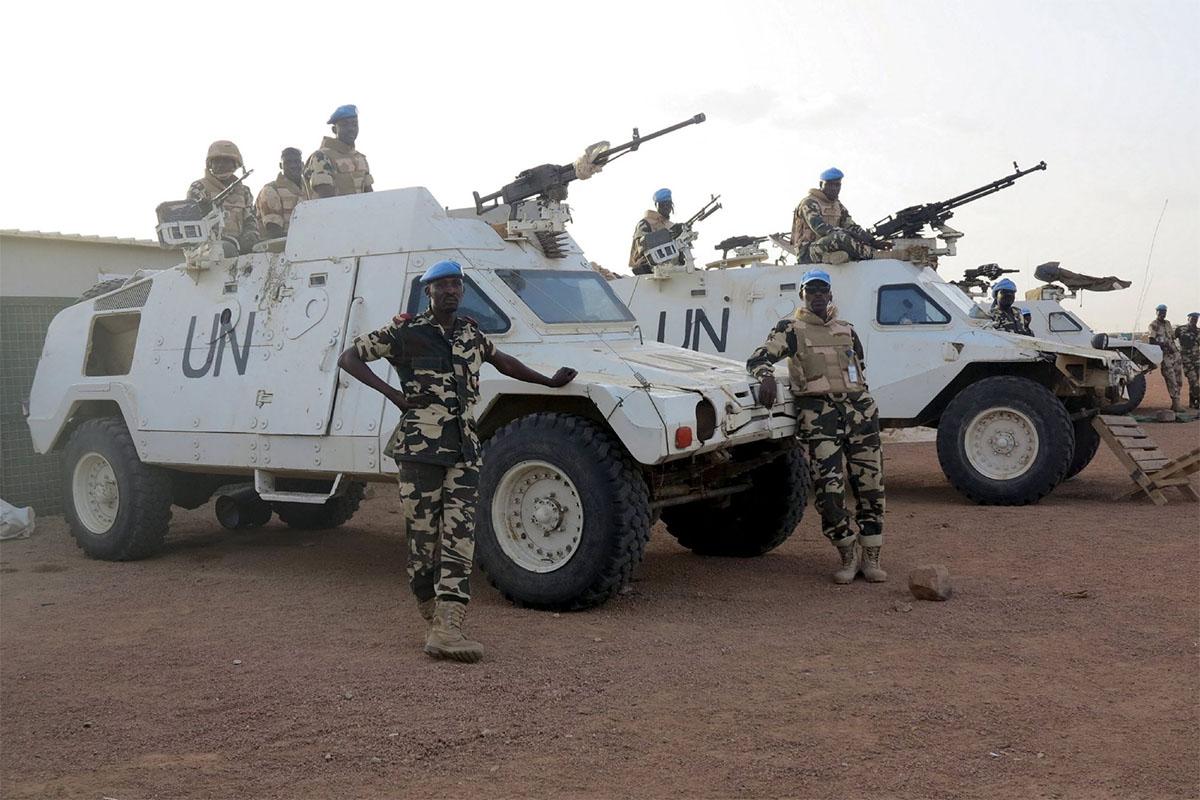 Chadian peacekeepers stand guard at the Minusma peacekeeping base in Kidal, Mali