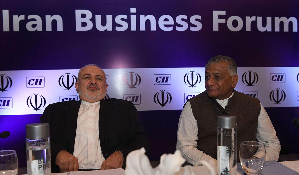 Iranian FM Javad Zarif (L) and Indian Minister of State for External Affairs VK Singh
