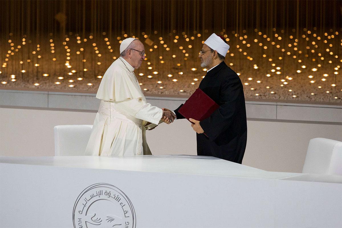 ope Francis (L) shakes hands with Ahmed Al-Tayeb, Grand Imam of Al Azhar, after signing the Human Fraternity Document