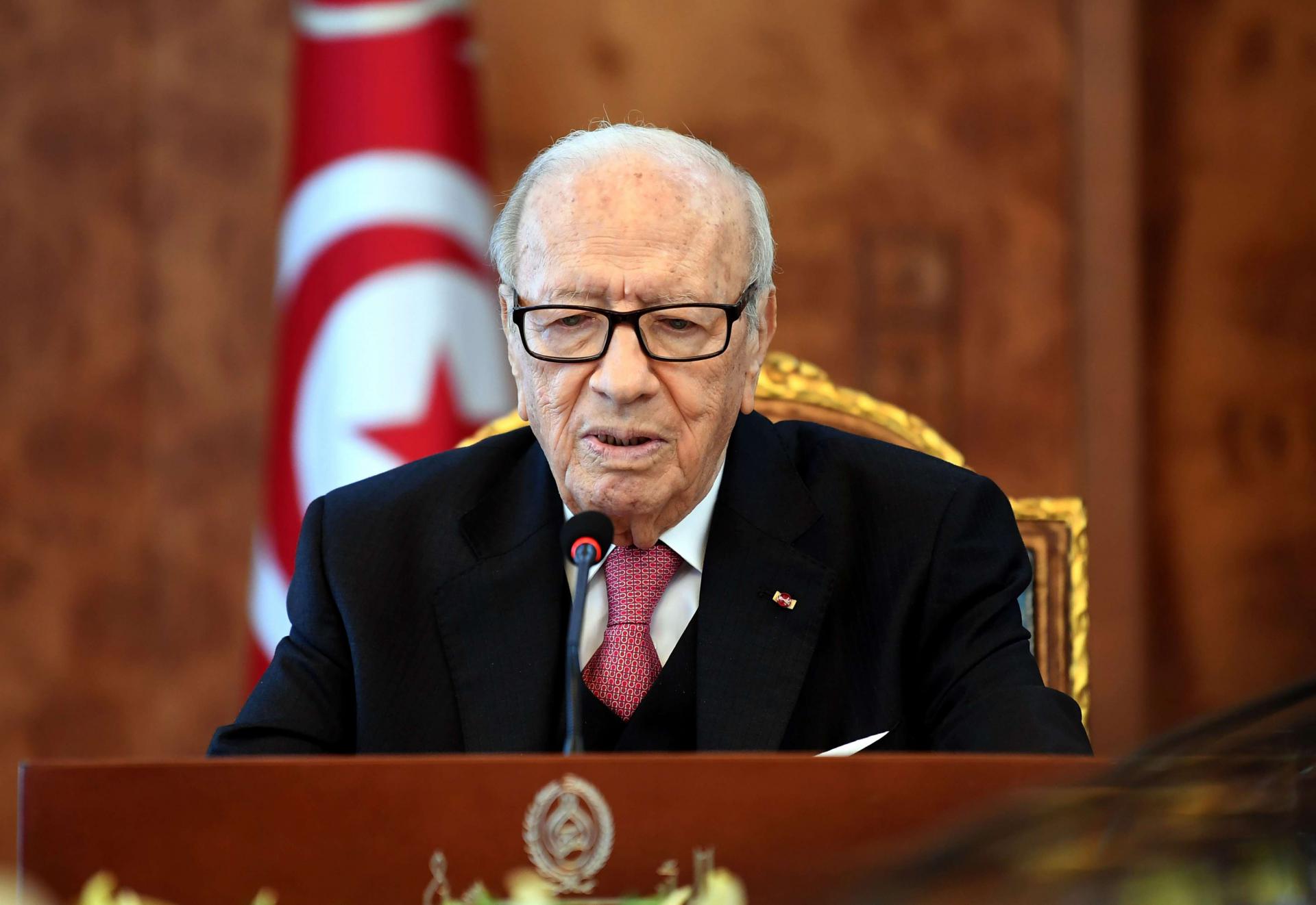 Tunisian President Beji Caid Essebsi attends a meeting with political parties, unions and employers on January 13, 2018 in Tunis, following unrest triggered by austerity measures.