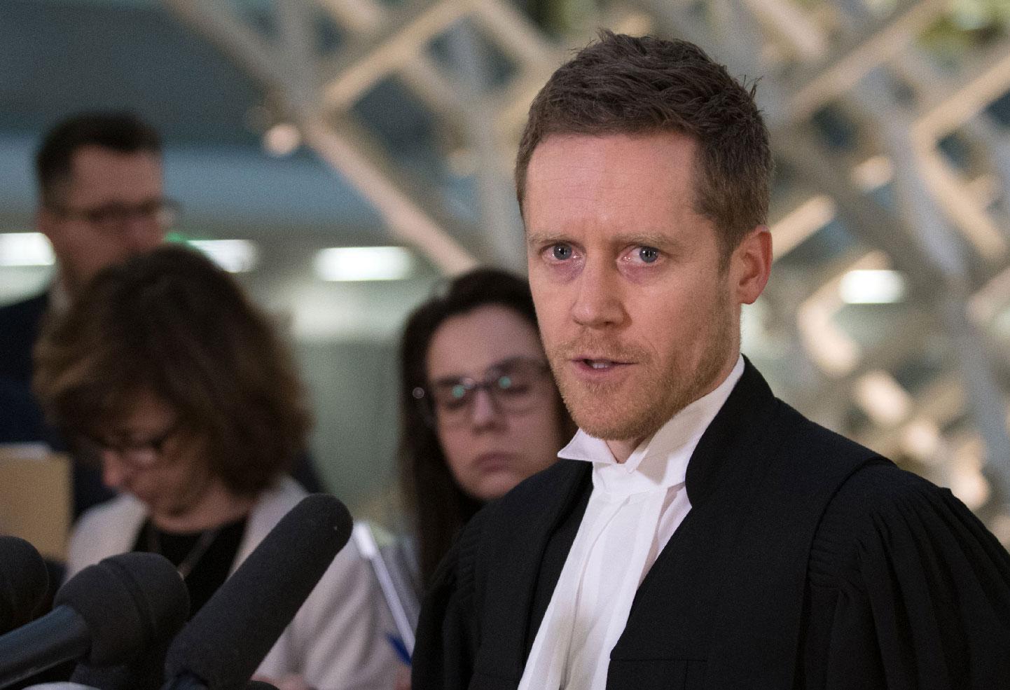 Crown prosecutor Thomas Jacques talks to the press in the Quebec City Courthouse following the sentencing of perpetrator Alexandre Bissonnette, on February 8, 2019.