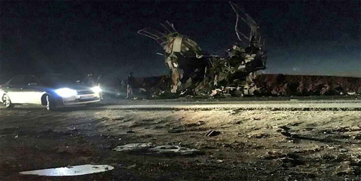 A picture released by the semi-governmental agency Fars News shows the damaged bus that was carrying members of Iran's Revolutionary Guards 