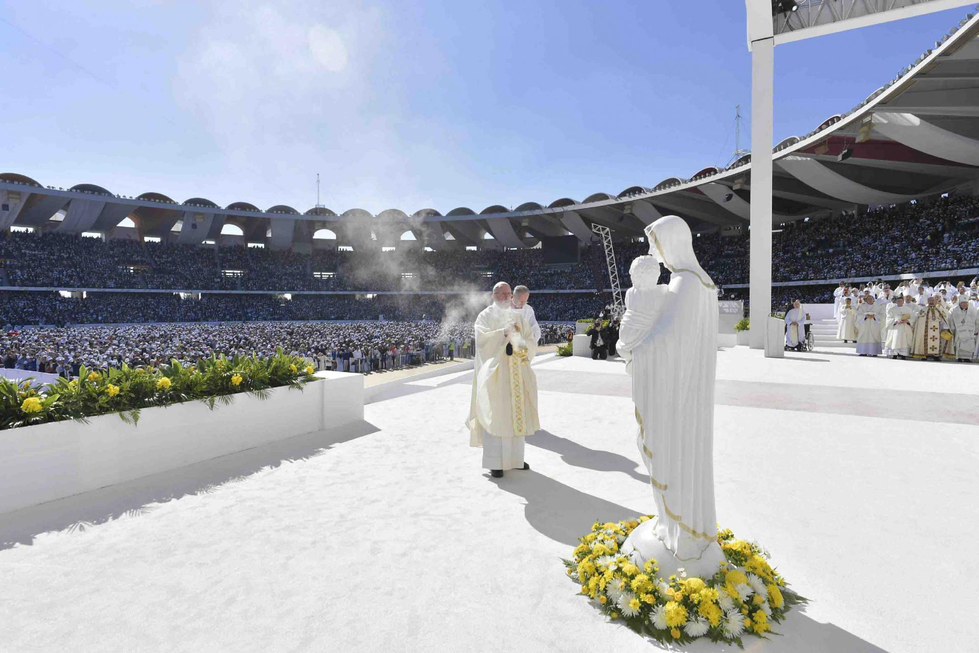 Tuesday's mass came a day after the pope called for an end to wars in the troubled Middle East, including in Yemen and Syria