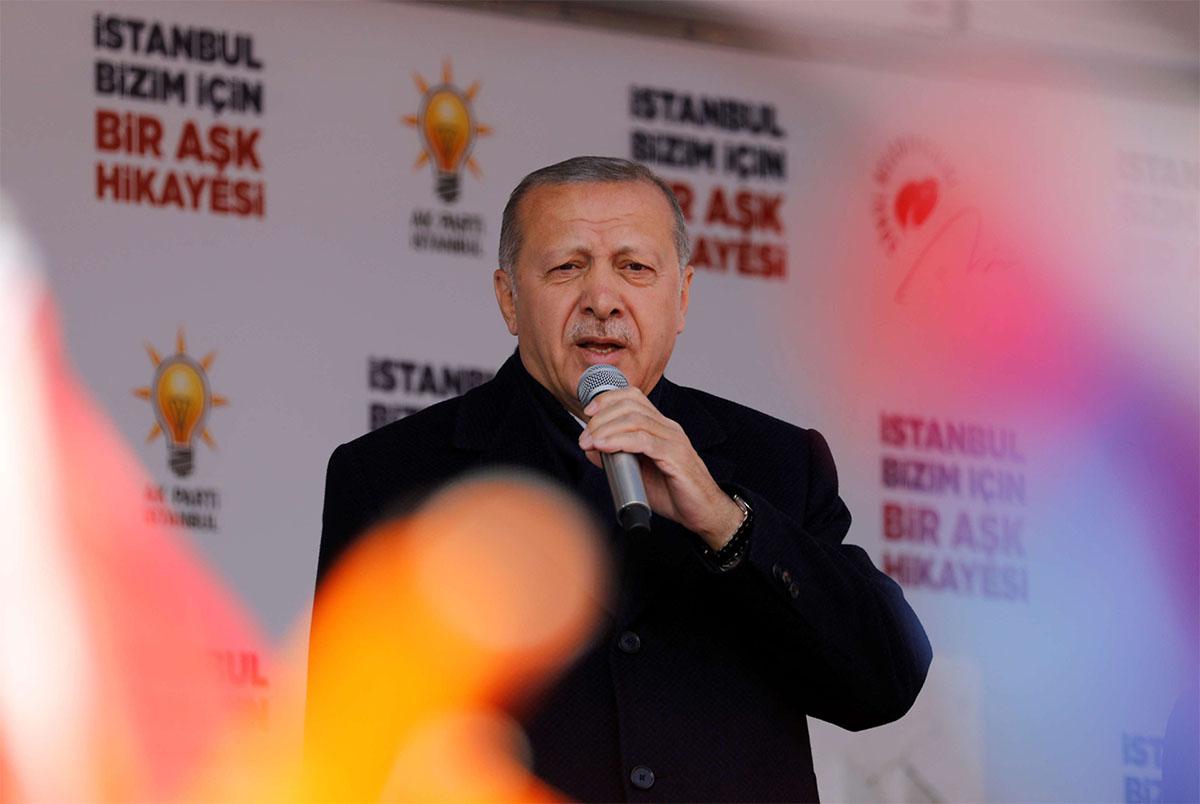 Turkish President Tayyip Erdogan addresses his supporters during a rally for the upcoming local elections in Istanbul