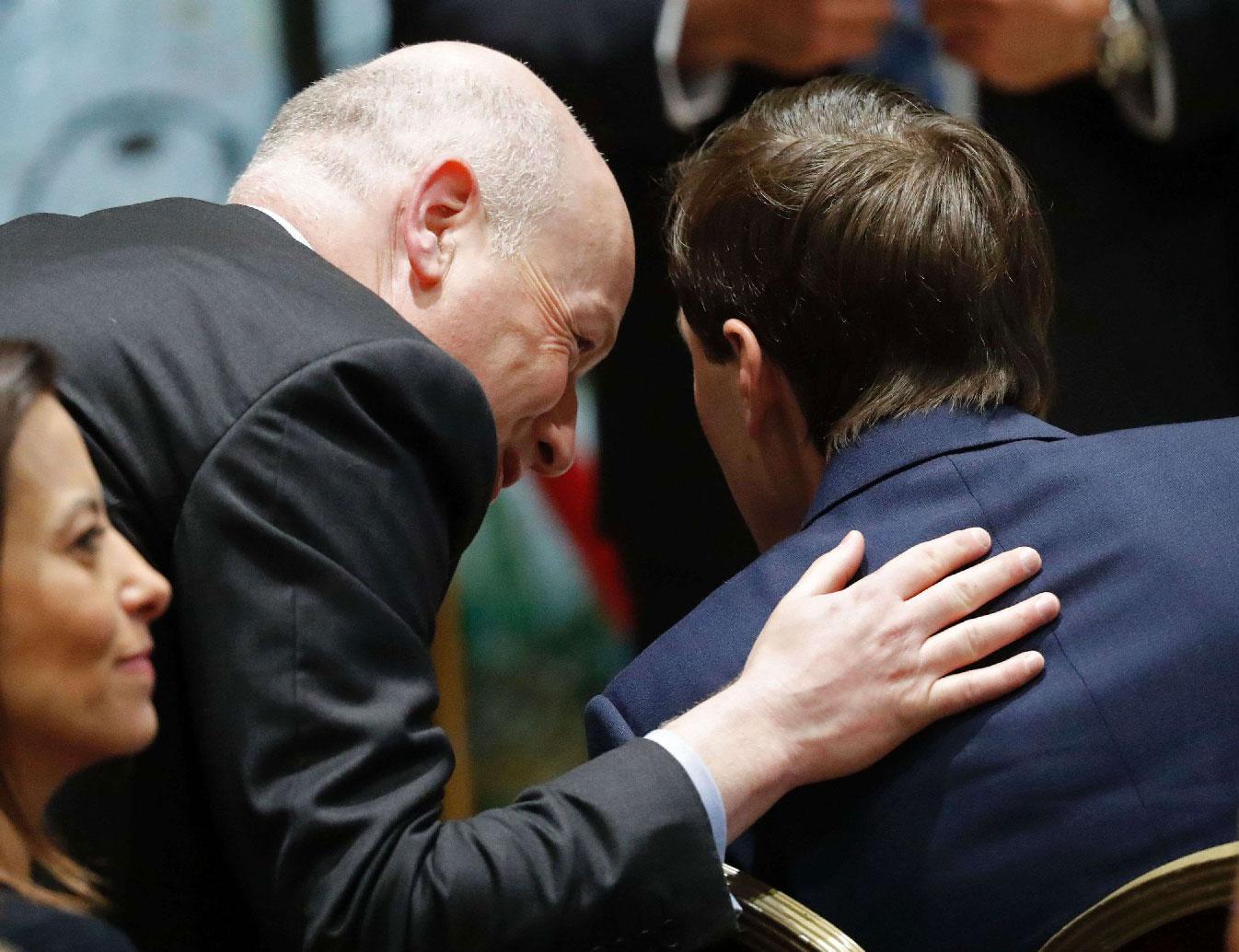 Jason Greenblatt (L) the US president's assistant and special representative for international negotiations, speaks to White House senior advisor Jared Kushner (C) during a press conference at the Israeli President's Residence in Jerusalem on May 22, 2017.