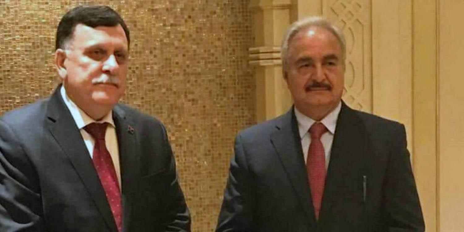 خليفة حفتر وفايز السراج في لقاء أبوظبي