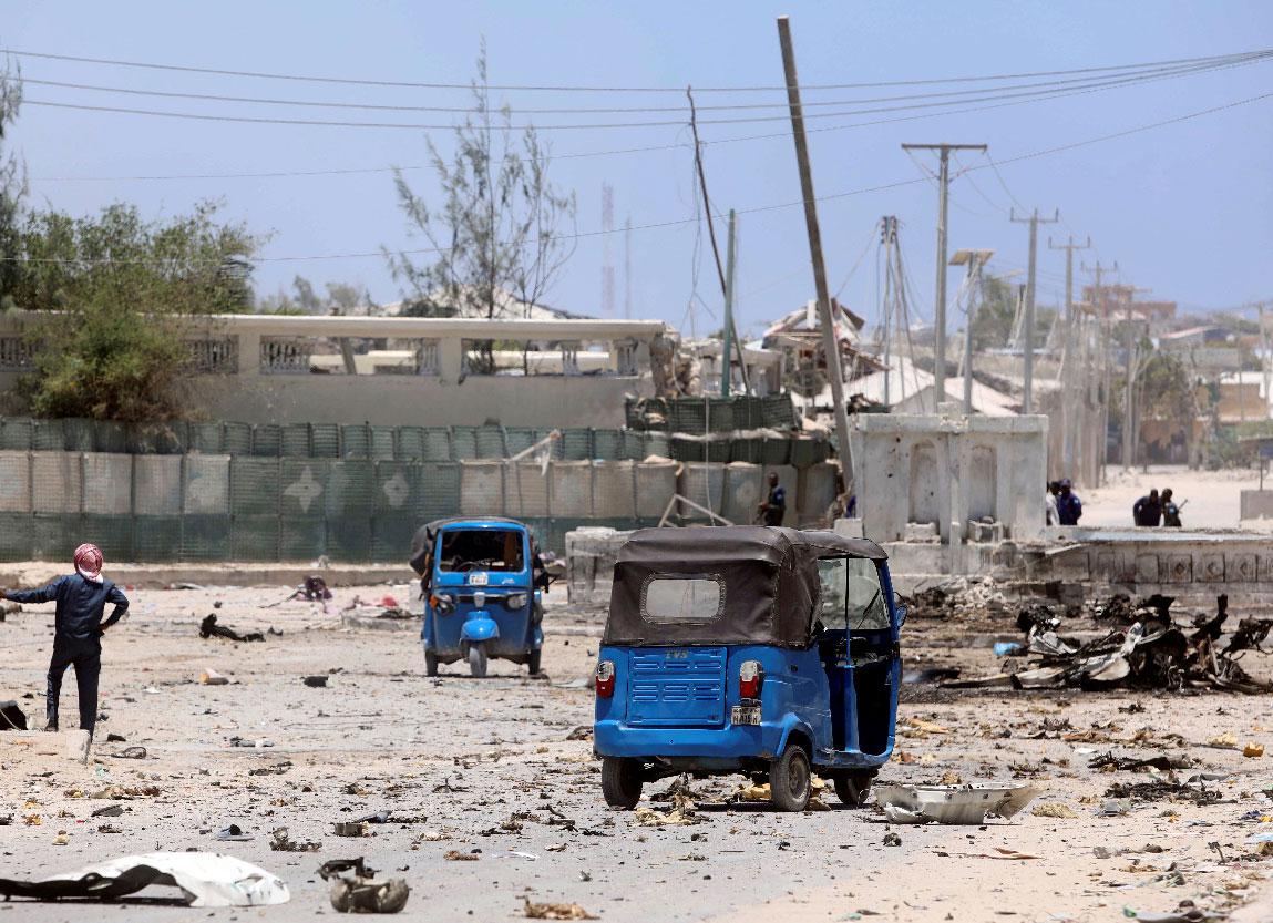 Rickshaws are seen near the scene of a suicide explosion after al-Shabaab militia stormed a government building in Mogadishu, Somalia March 23, 2019. 