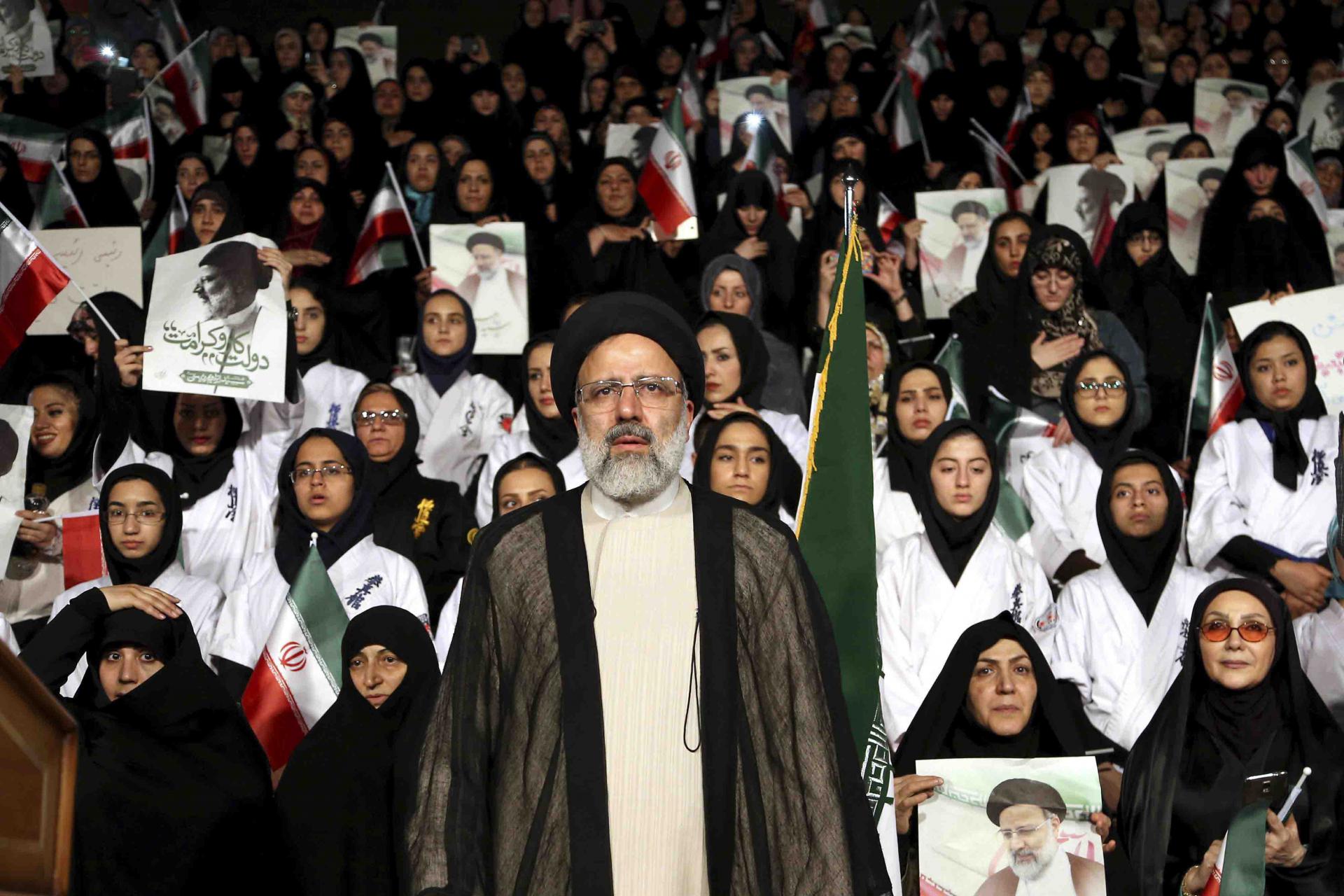He bears the title of Hojjat al-Islam, which is a rank under Ayatollah in the Shiite cleric hierarchy.