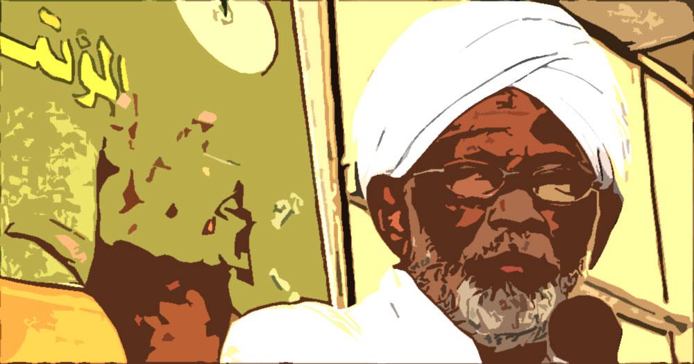 عصاه الخيزرانية المتشبهة بعصا المارشالية والمتكيفة لظهور السودانيين الملتمعة تحت الشمس