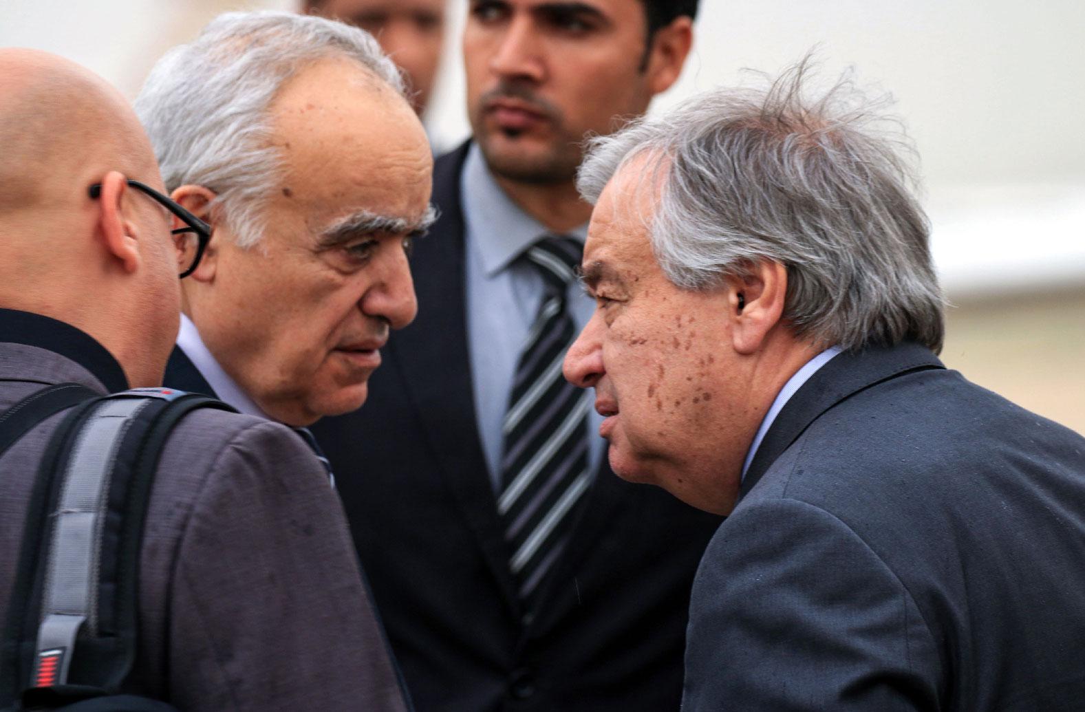 United Nations Secretary-General Antonio Guterres (R) speaks with Ghassan Salame (L), UN special envoy for Libya and head of the UN Support Mission in Libya (UNSMIL), at Benina International Airport in Libya's eastern city of Benghazi on April 5, 2019.