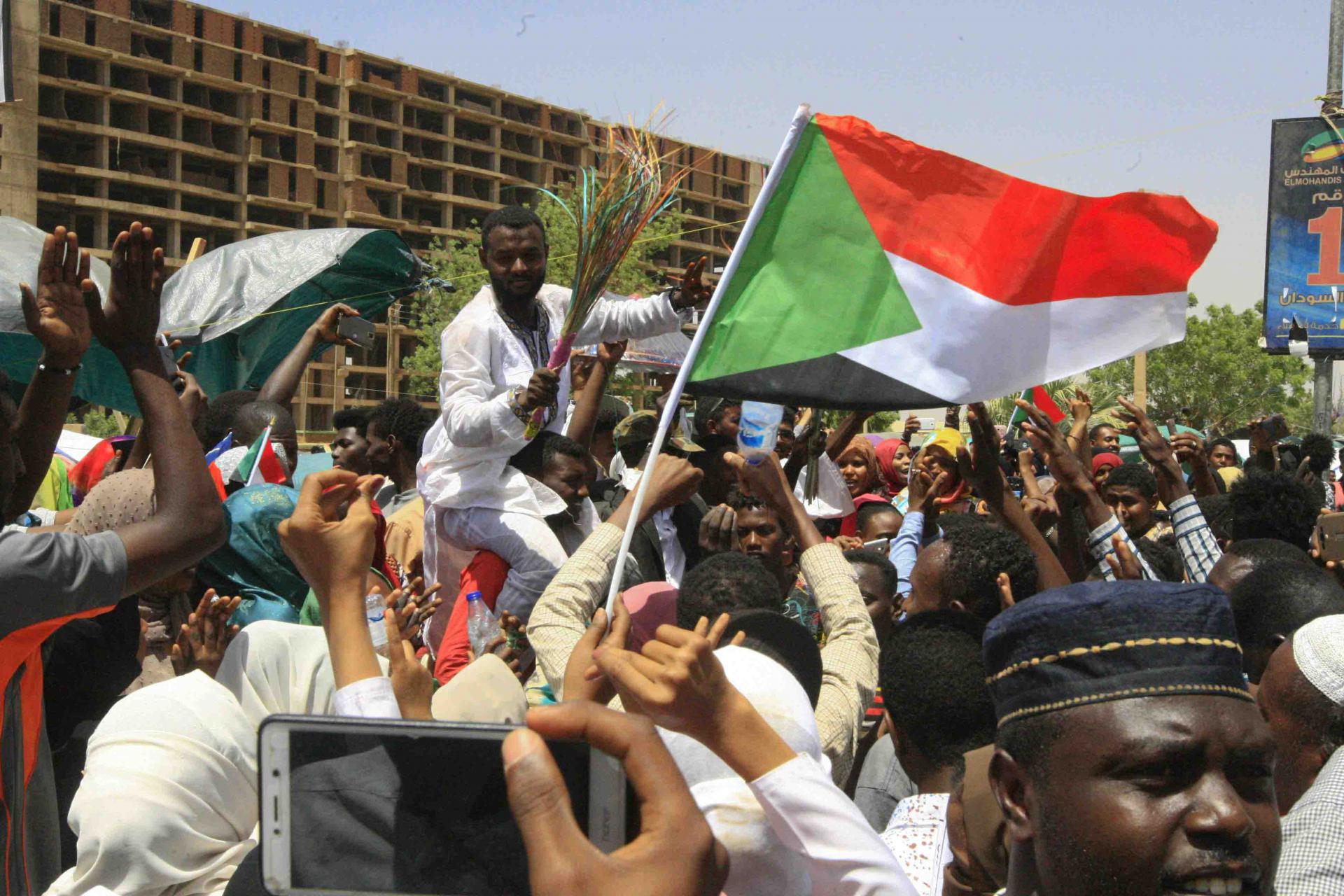 The newly formed 10-member transitional council contains several faces from Bashir's regime