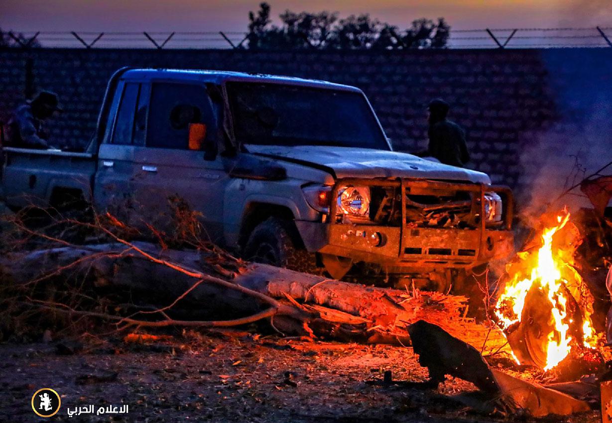 This image obtained from the Libyan strongman Khalifa Haftar's self-proclaimed Libyan National Army (LNA) War Information Division's Facebook page and released on April 10, 2019, reportedly shows a burning vehicle outside the 4th Brigade camp in al-Aziziyah, located some 40 kilometres south of the Libyan capital Tripoli.