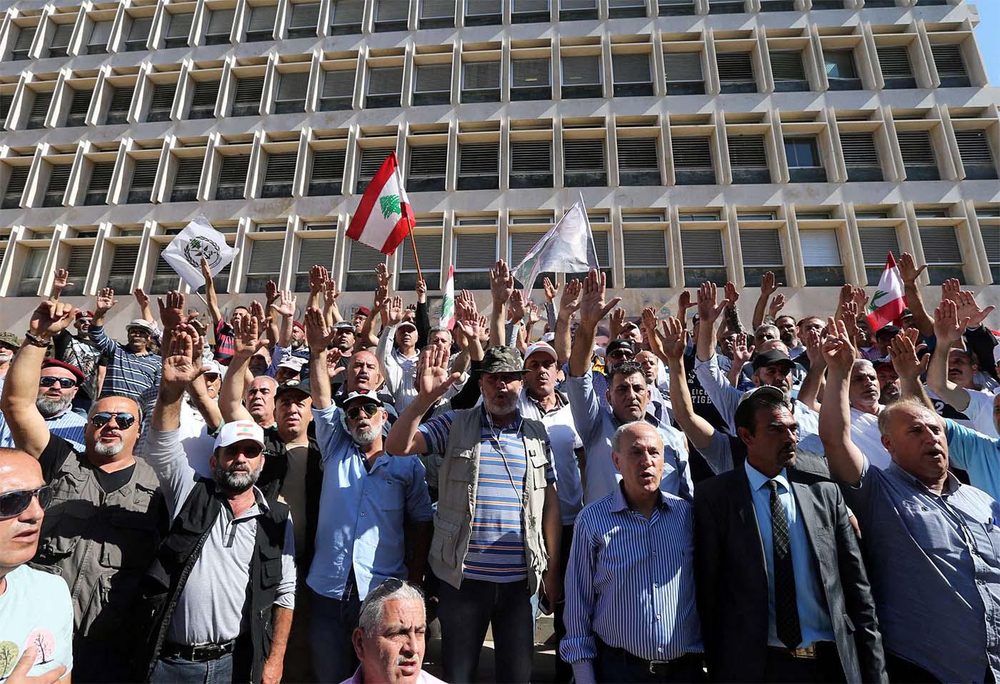 Retired Lebanese soldiers take part in a protest against draft state budget proposals