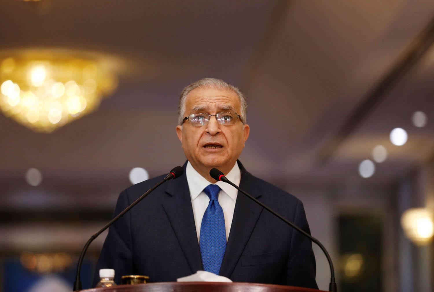 وزير الخارجية العراقي محمد علي الحكيم في مؤتمر صحفي في بغداد