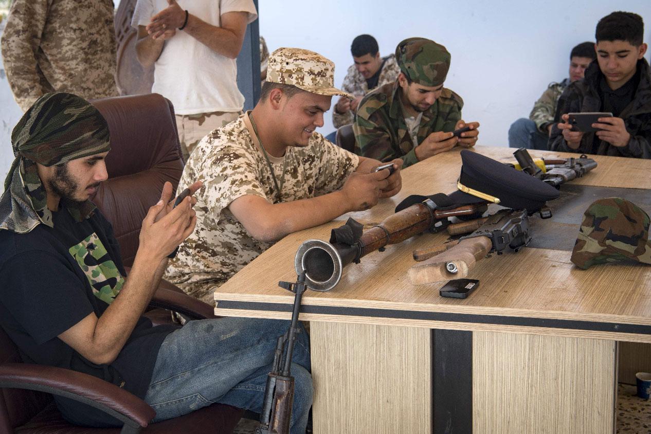 Fighters loyal to the internationally-recognised GNA play online video game PlayerUnknown's Battlegrounds